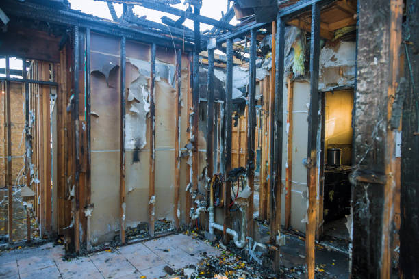 Professional Fire Damage Repair technician working in Moriches, NY